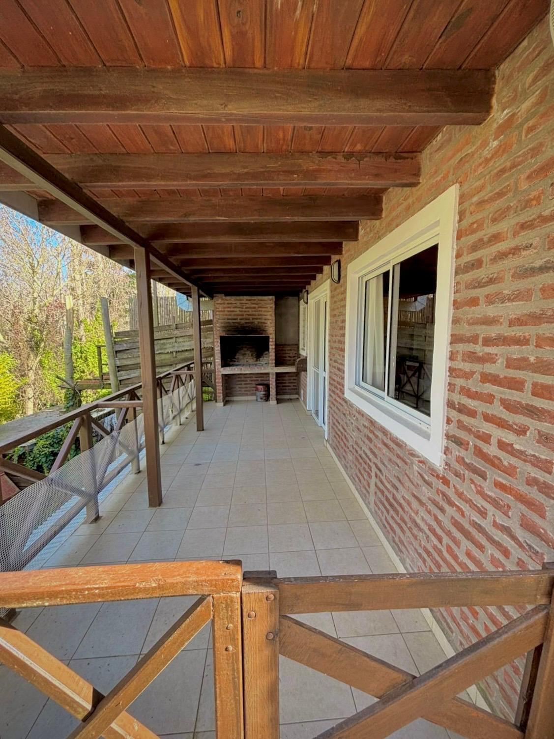 Covered balcony with its own grill