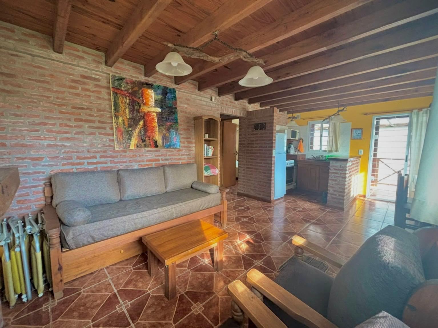 Living room of the 3-room cabin with open kitchen