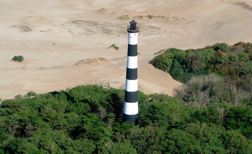 Querandí Lighthouse among dunes and forest